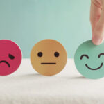 Hand choosing green happy smiley face paper cut, product, user,